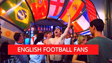 [EN] English football fans celebrate the winning match in the sport pub at West Kensington, London