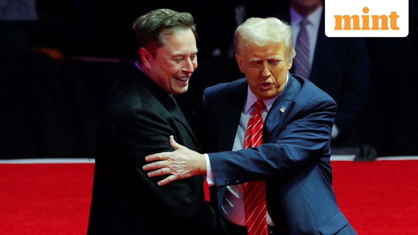 President Donald Trump and Elon Musk sit side by side, shake hands at Charlie Kirk Memorial. Watch video